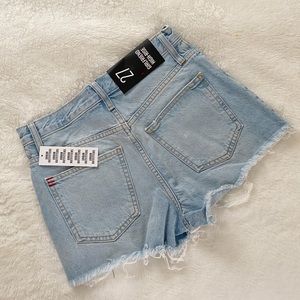 Urban Outfitters BDG “Girlfriend High-Waisted Denim Short”.
